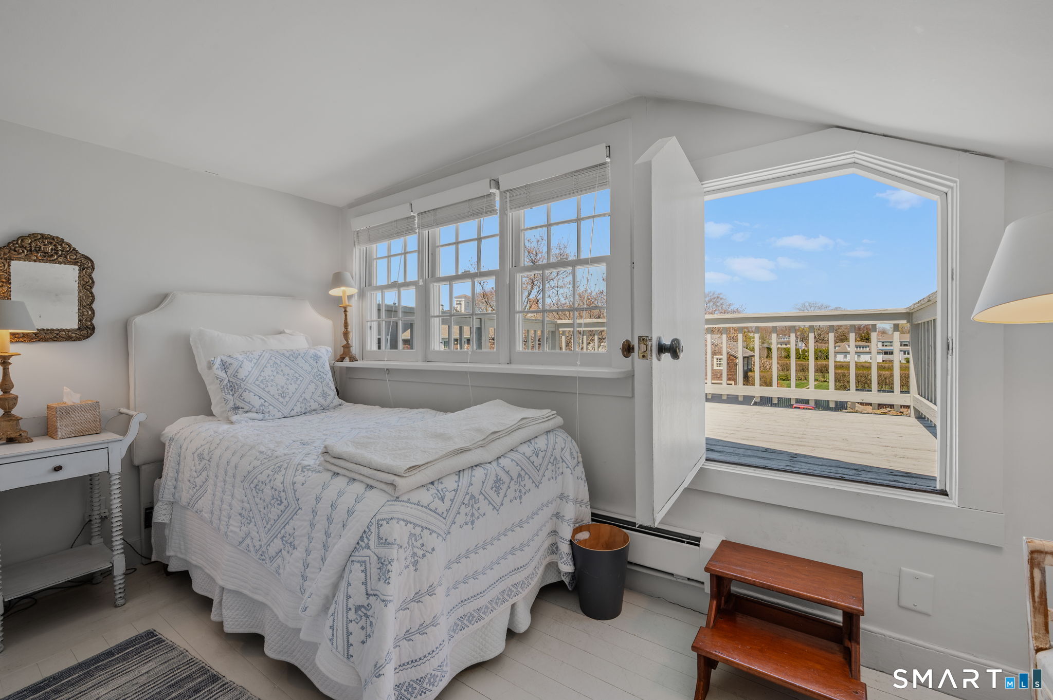 20 Diving Street Stonington, CT 06378 - Photo 23 of 33 a bedroom with a bed and a window