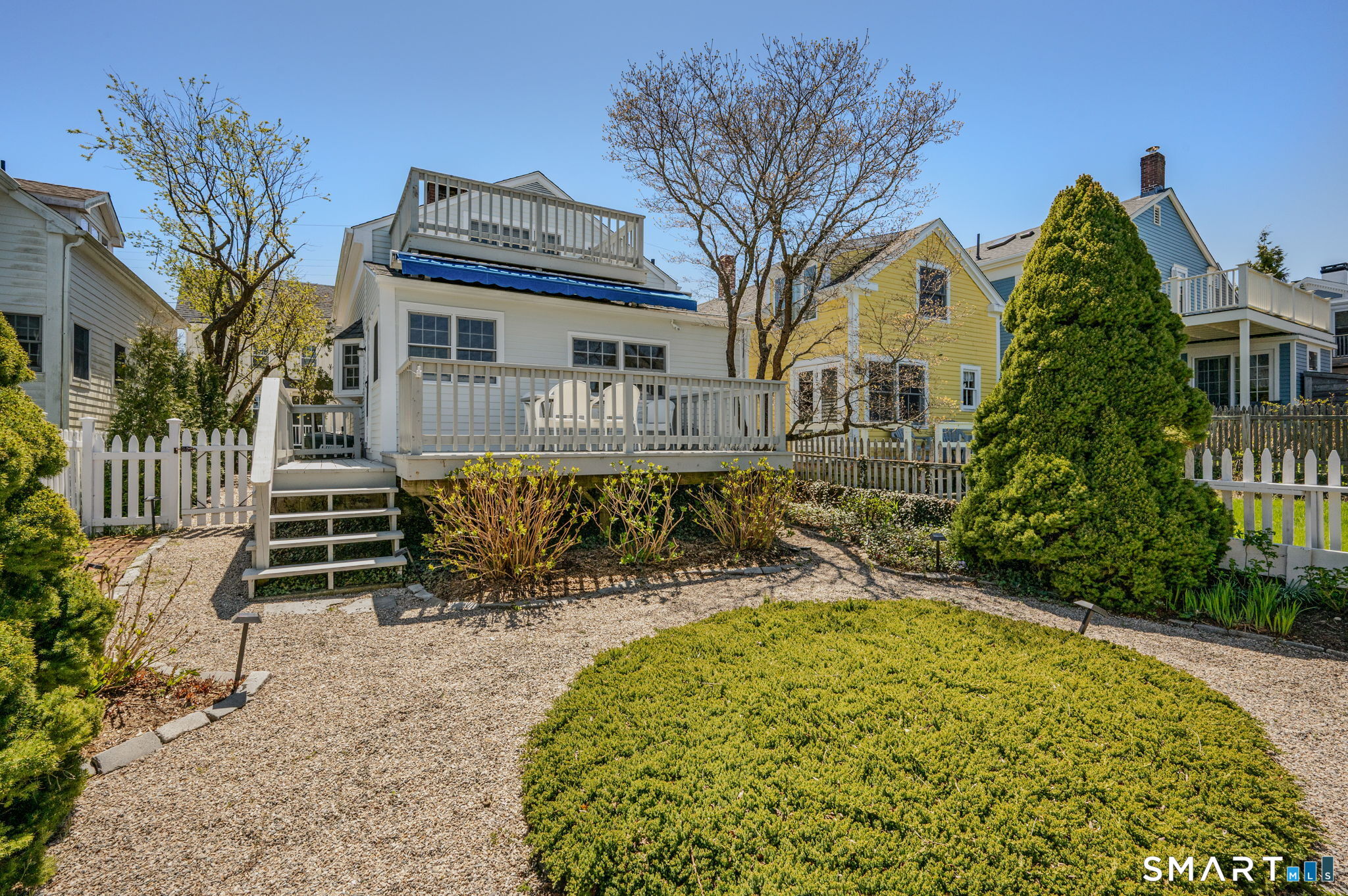 20 Diving Street Stonington, CT 06378 - Photo 27 of 33 a view of a house with a yard