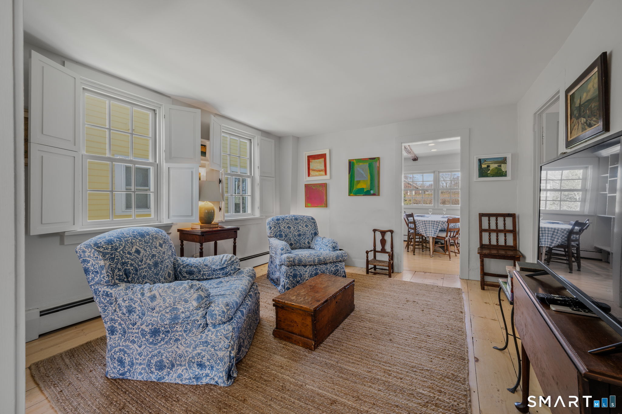 20 Diving Street Stonington, CT 06378 - Photo 7 of 33 a living room with furniture and a flat screen tv