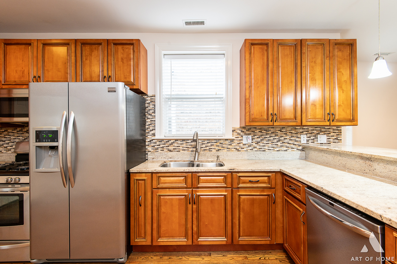 4820 West George Street, Unit 2 Chicago, IL 60641 - Photo 16 of 24 a kitchen with granite countertop a refrigerator and a sink