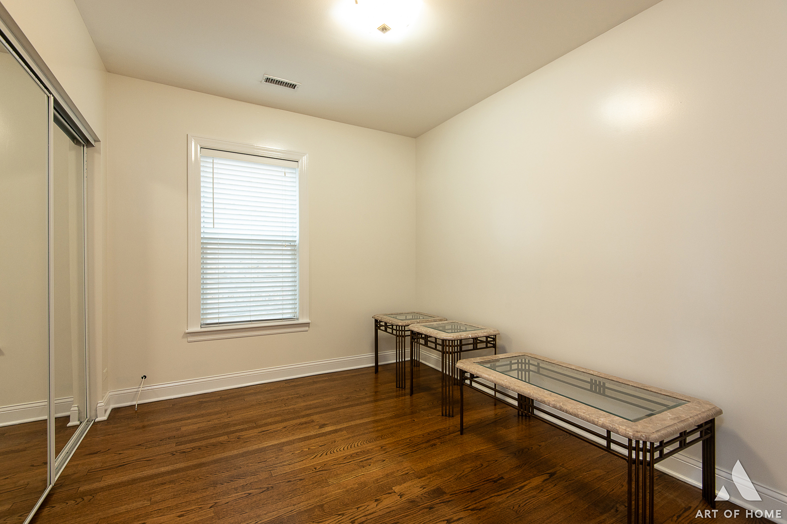 4820 West George Street, Unit 2 Chicago, IL 60641 - Photo 19 of 24 a room with wooden floor and a window