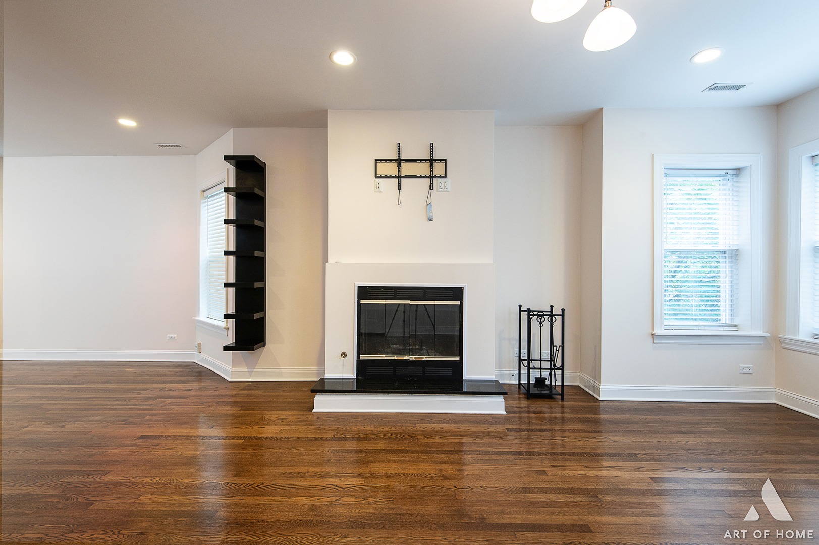 4820 West George Street, Unit 2 Chicago, IL 60641 - Photo 24 of 24 an empty room with windows and a fireplace