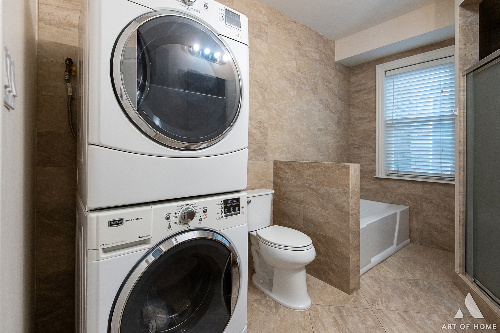 4820 West George Street, Unit 2 Chicago, IL 60641 - Photo 6 of 24 a bathroom with a toilet and a sink