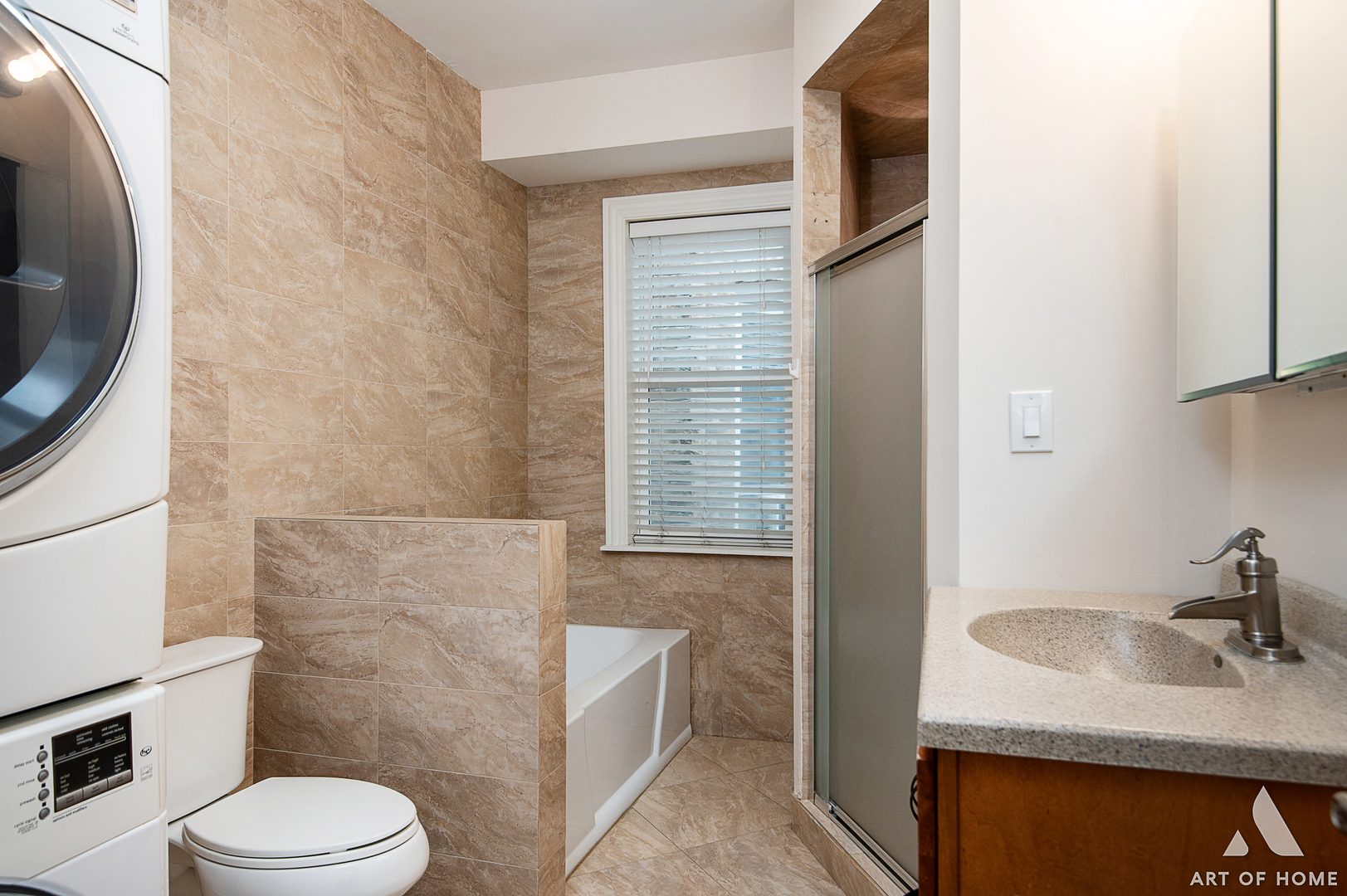 4820 West George Street, Unit 2 Chicago, IL 60641 - Photo 9 of 24 a bathroom with a granite countertop sink toilet and shower