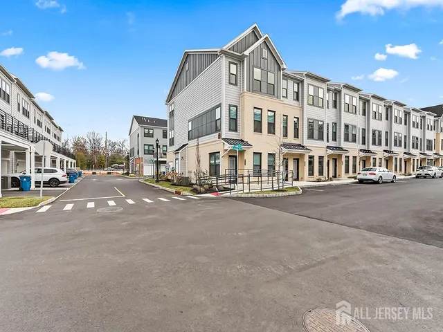 a city street lined with buildings and a street view