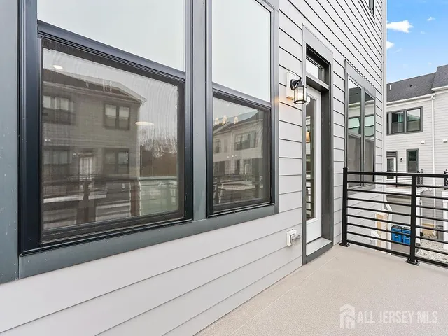 a view of a door and a window
