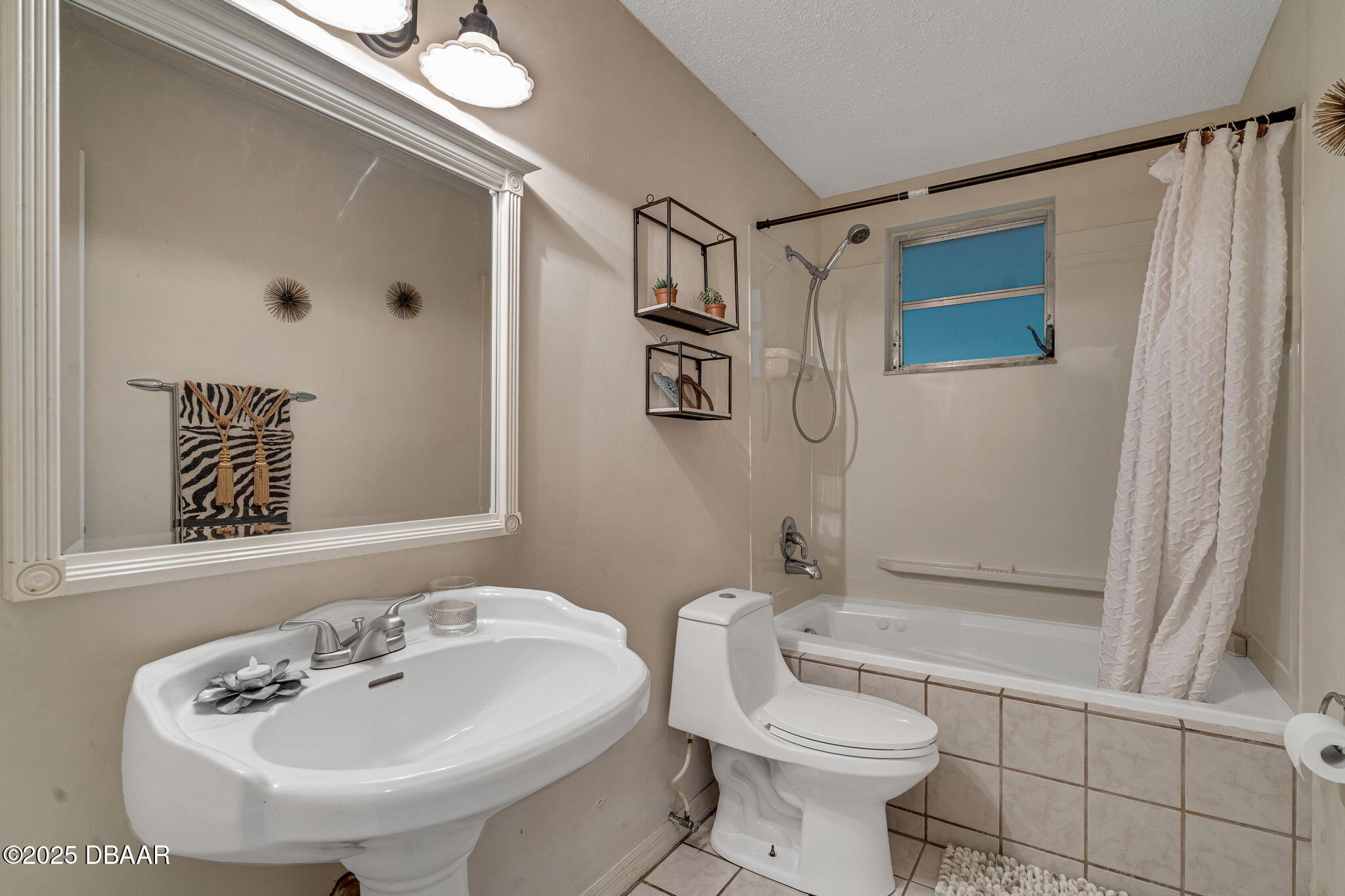 2439 Old Samsula Road Port Orange, FL 32128 - Photo 24 of 35 a bathroom with a sink toilet and shower