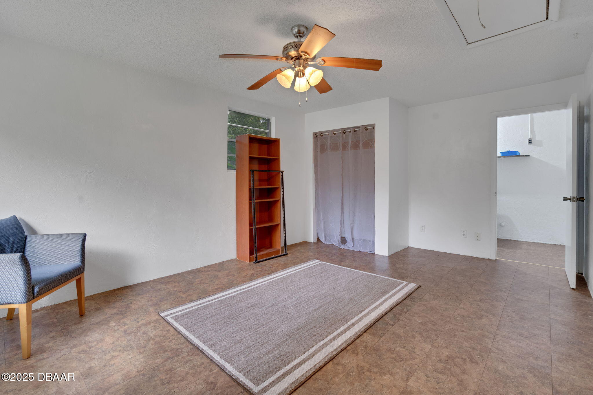 2439 Old Samsula Road Port Orange, FL 32128 - Photo 27 of 35 a view of an empty room with a window