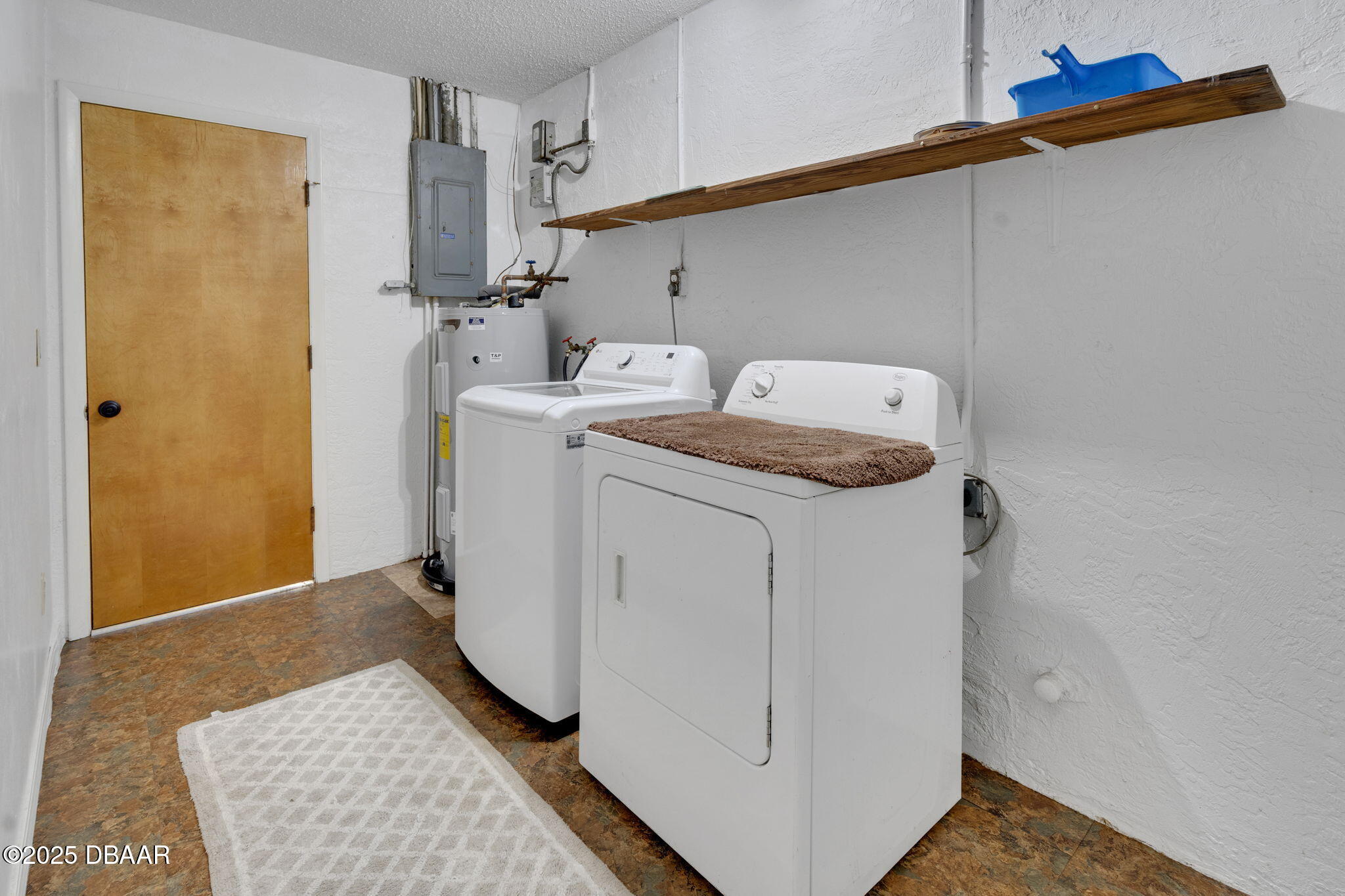 2439 Old Samsula Road Port Orange, FL 32128 - Photo 29 of 35 a utility room with dryer and washer