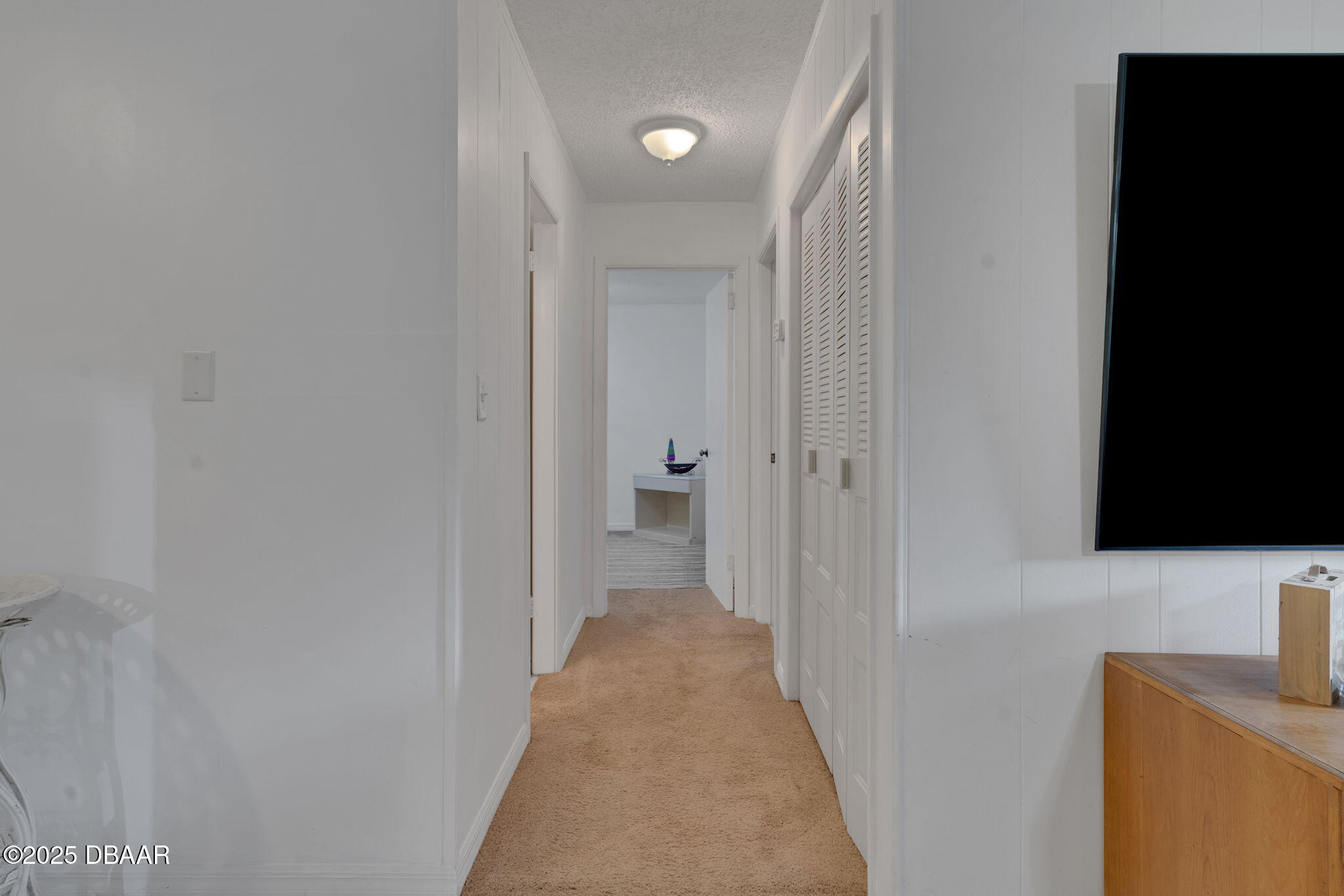 2439 Old Samsula Road Port Orange, FL 32128 - Photo 33 of 35 a view of a livingroom from a hallway