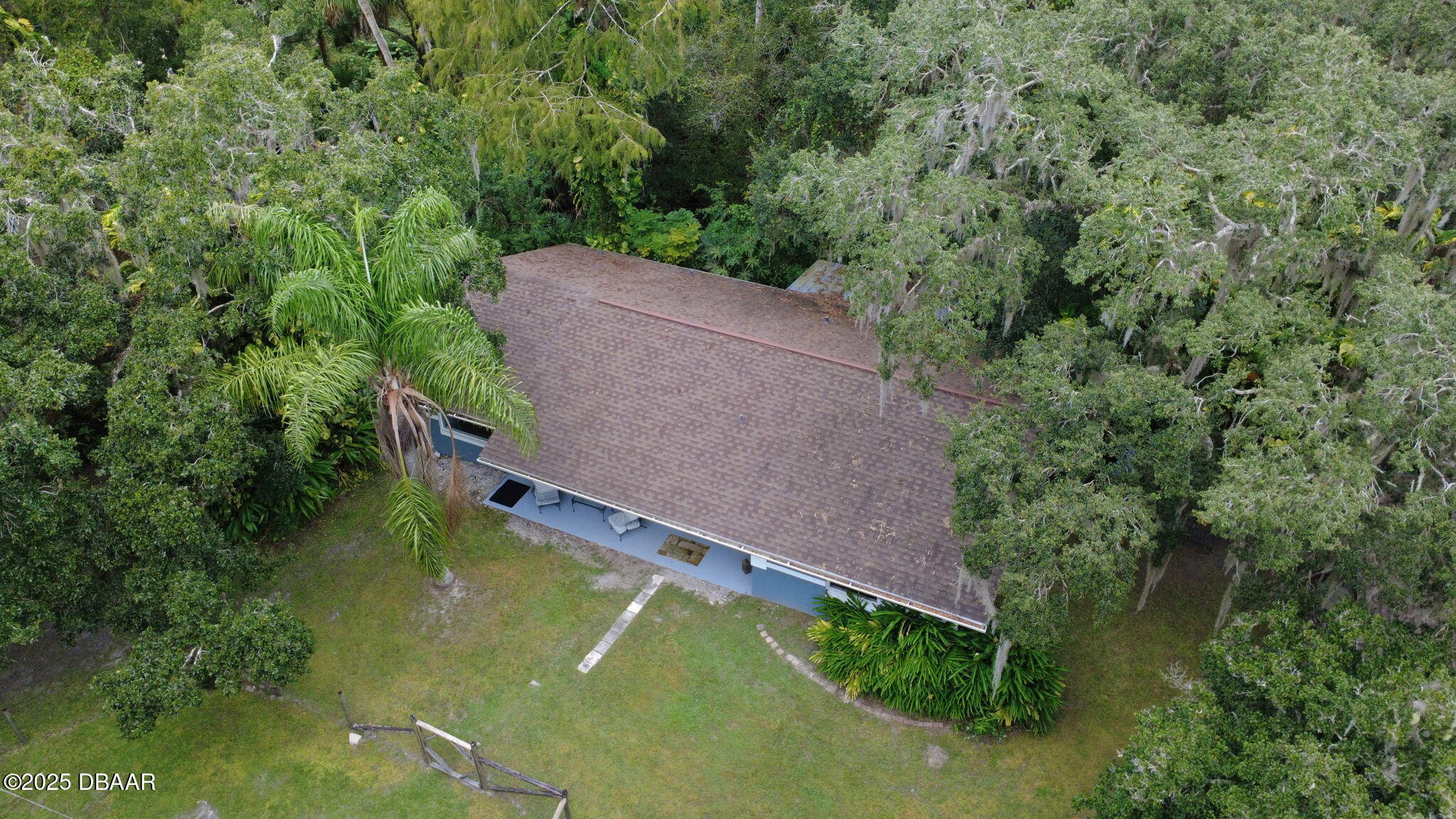 2439 Old Samsula Road Port Orange, FL 32128 - Photo 5 of 35 a view of a yard with a house