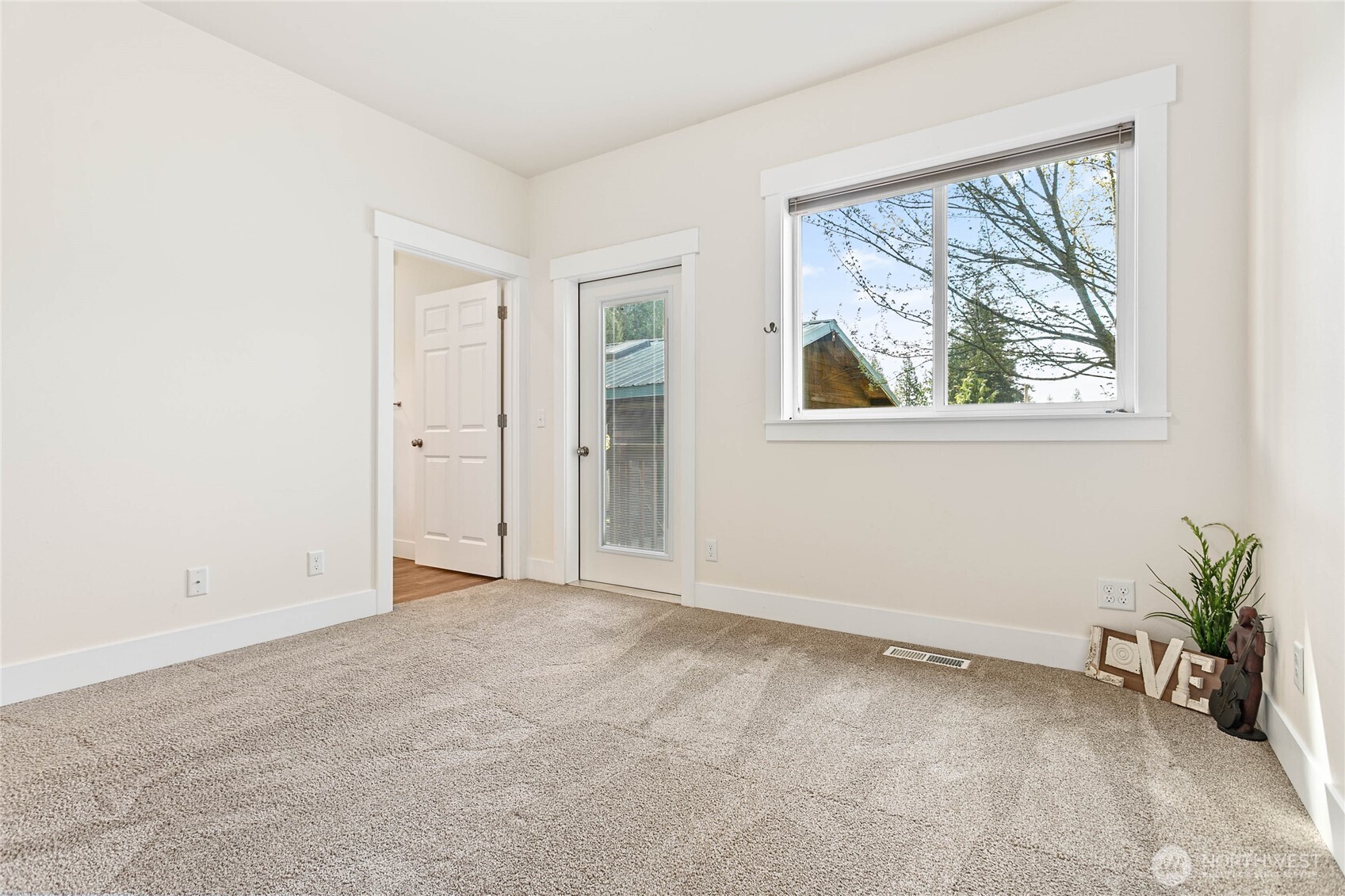 4597 Orcas Way Ferndale, WA 98248 - Photo 22 of 40 an empty room with windows and closet
