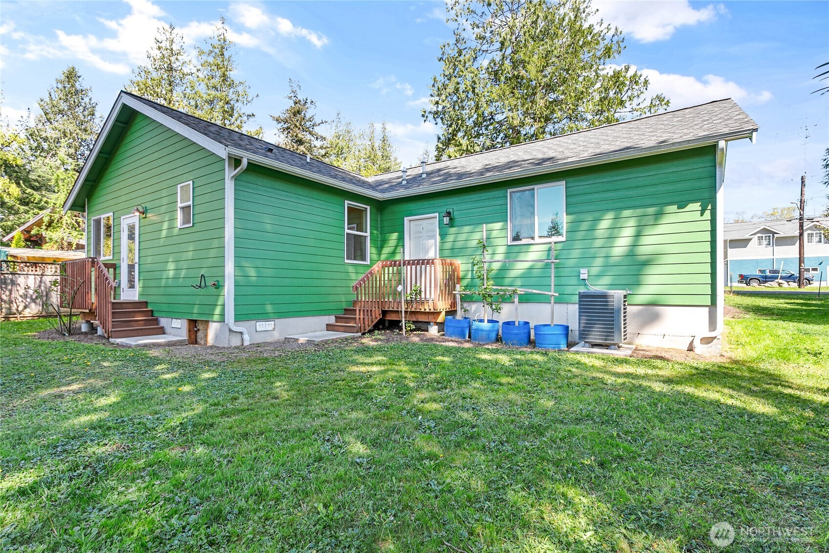 4597 Orcas Way Ferndale, WA 98248 - Photo 28 of 40 a view of a house with a yard and sitting area