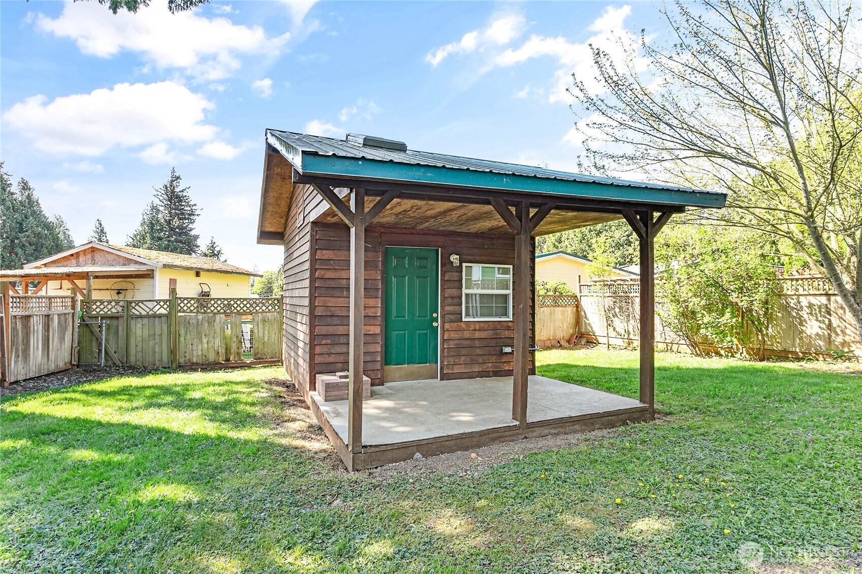 4597 Orcas Way Ferndale, WA 98248 - Photo 29 of 40 a view of a small house with a yard