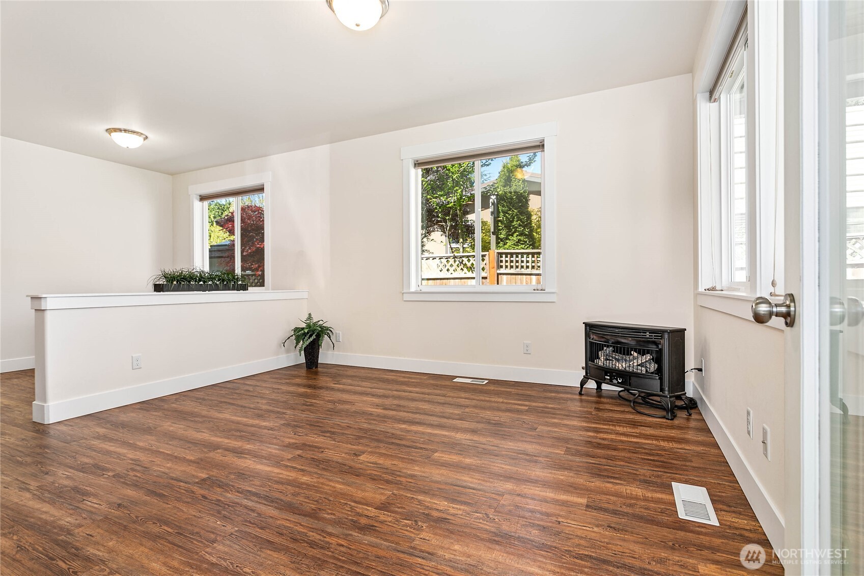 4597 Orcas Way Ferndale, WA 98248 - Photo 3 of 40 a view of a livingroom with wooden floor and furniture