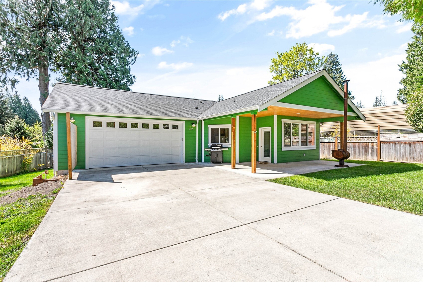 4597 Orcas Way Ferndale, WA 98248 - Photo 40 of 40 a front view of a house with a yard and garage