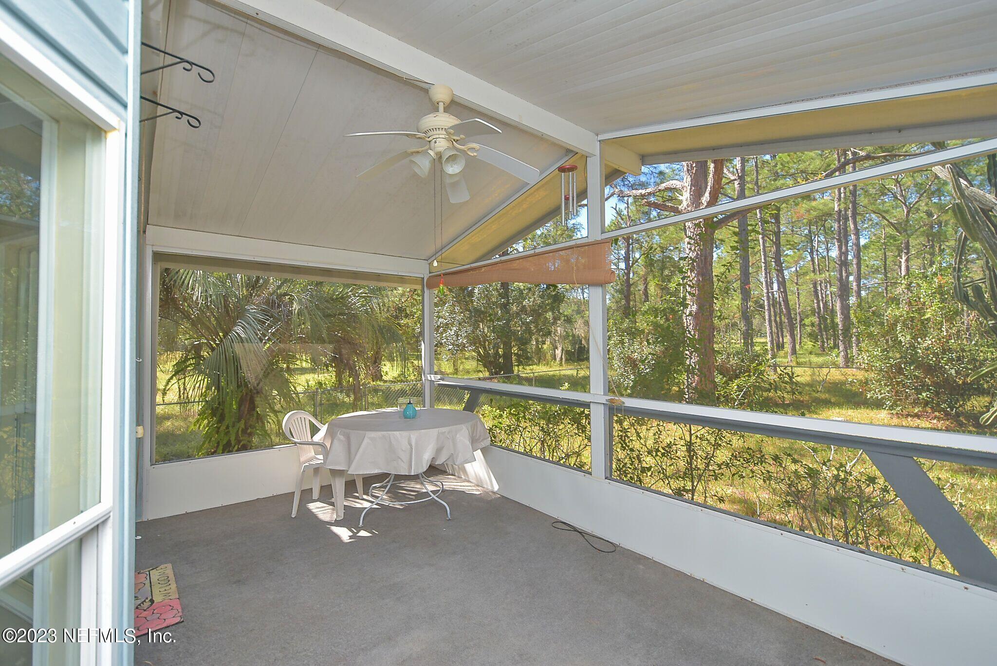 136 Lawrence Lane Georgetown, FL 32139 - Photo 3 of 33 a living room with large windows