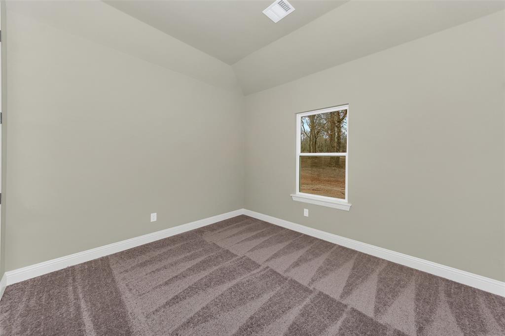 1057 Vh Ranch Poolville, TX 76487 - Photo 27 of 33 wooden floor and window in a room