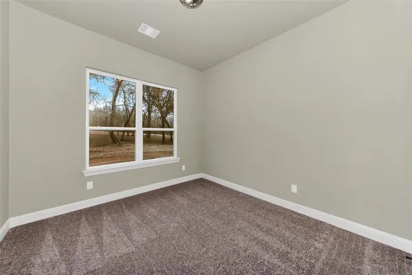 an empty room with window