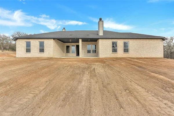 a front view of a house with a garage