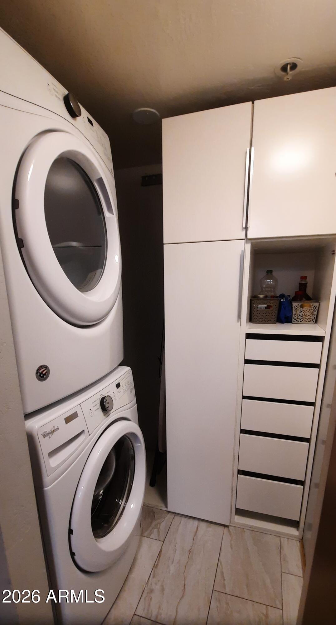 12221 West Bell Road, Unit 149 Surprise, AZ 85378 - Photo 10 of 28 a utility room with dryer and washer