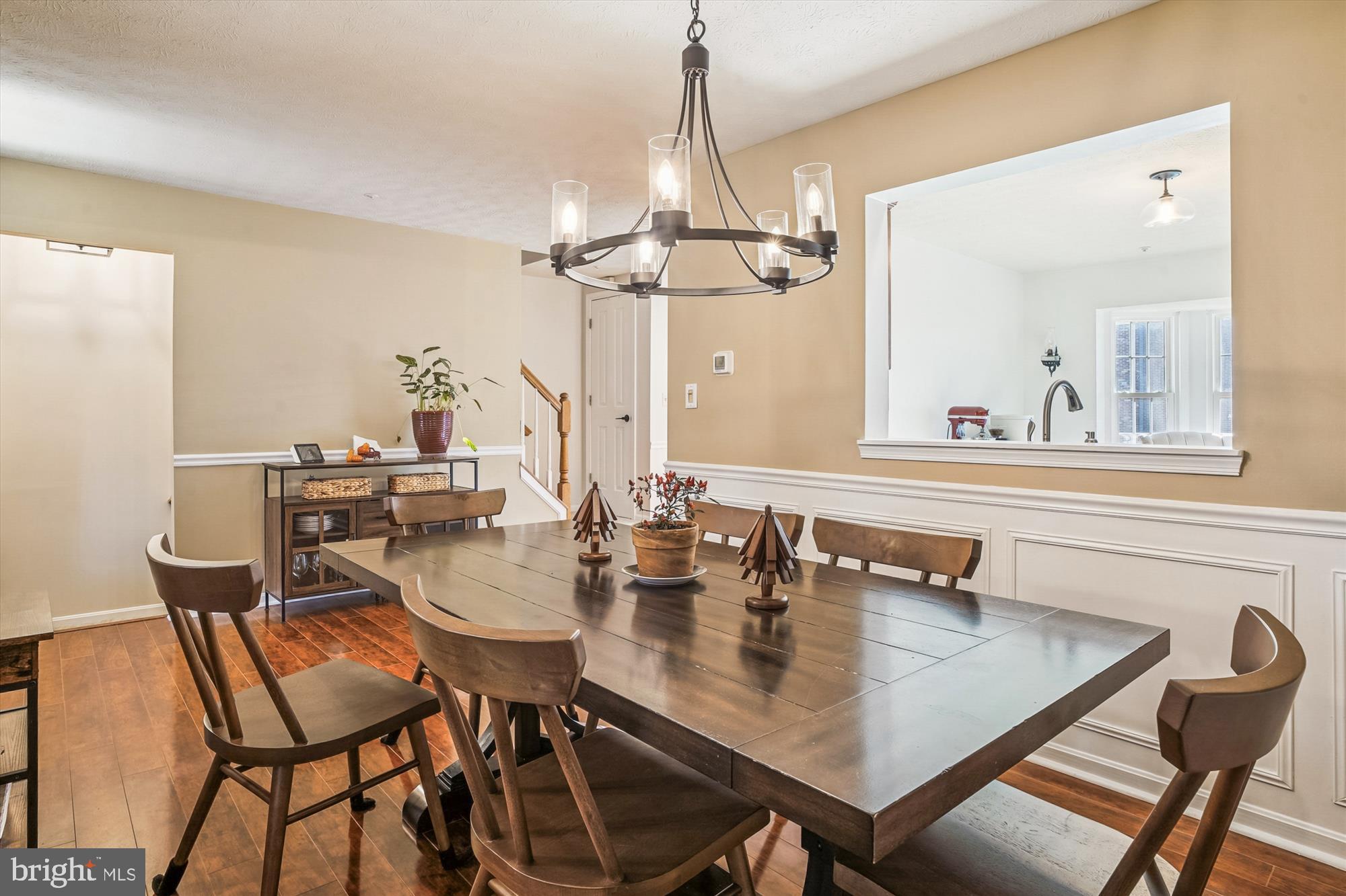 2542 Windy Oak Court Crofton, MD 21114 - Photo 11 of 37 a view of a dining room with furniture and a chandelier