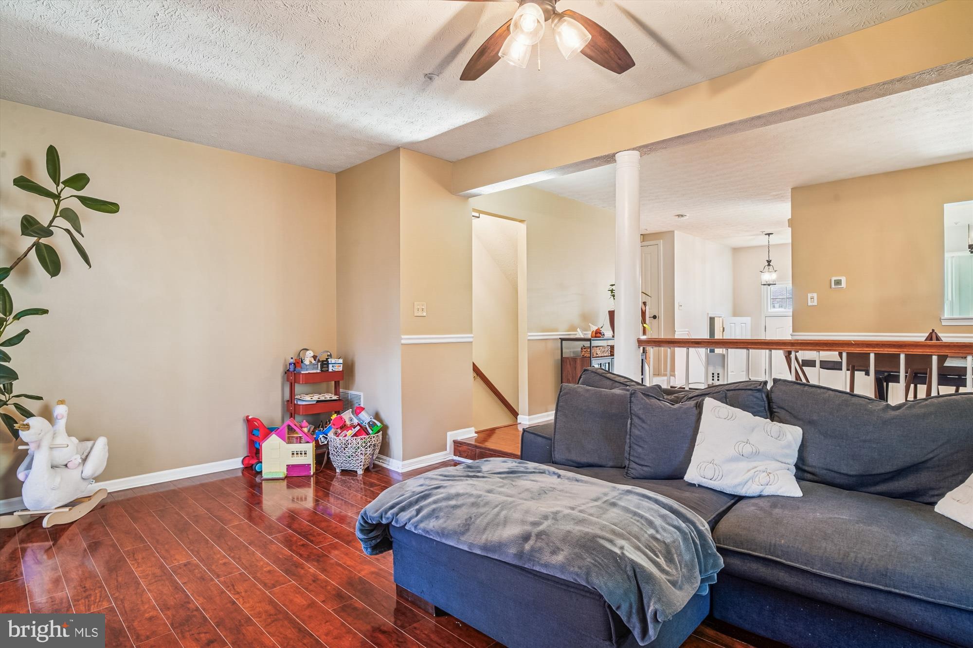 2542 Windy Oak Court Crofton, MD 21114 - Photo 17 of 37 a living room with furniture and wooden floor
