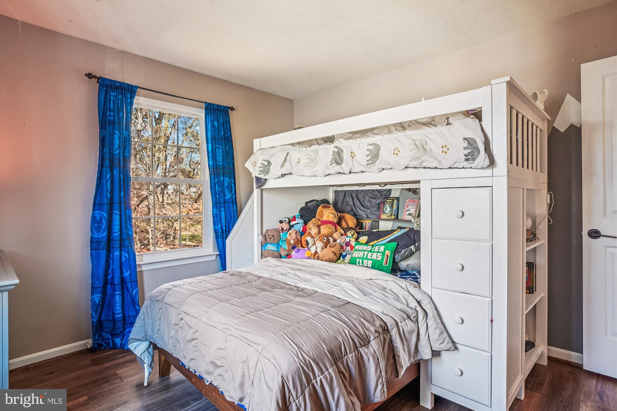 2542 Windy Oak Court Crofton, MD 21114 - Photo 23 of 37 a bed sitting in a bedroom next to a window