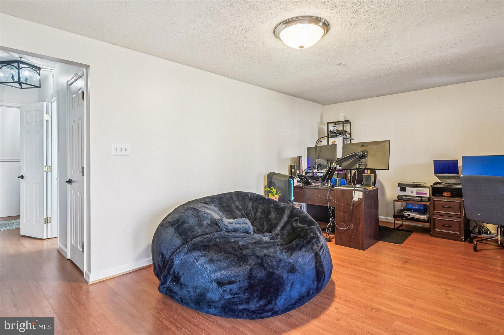 2542 Windy Oak Court Crofton, MD 21114 - Photo 29 of 37 a living room with furniture and a wooden floor