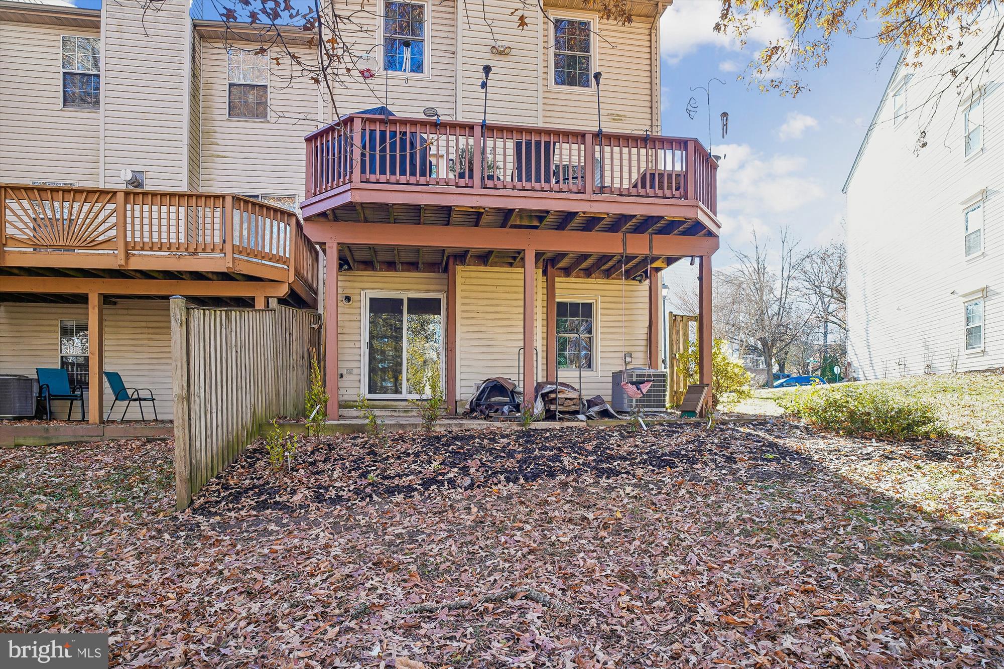2542 Windy Oak Court Crofton, MD 21114 - Photo 32 of 37 a front view of a house with a garden