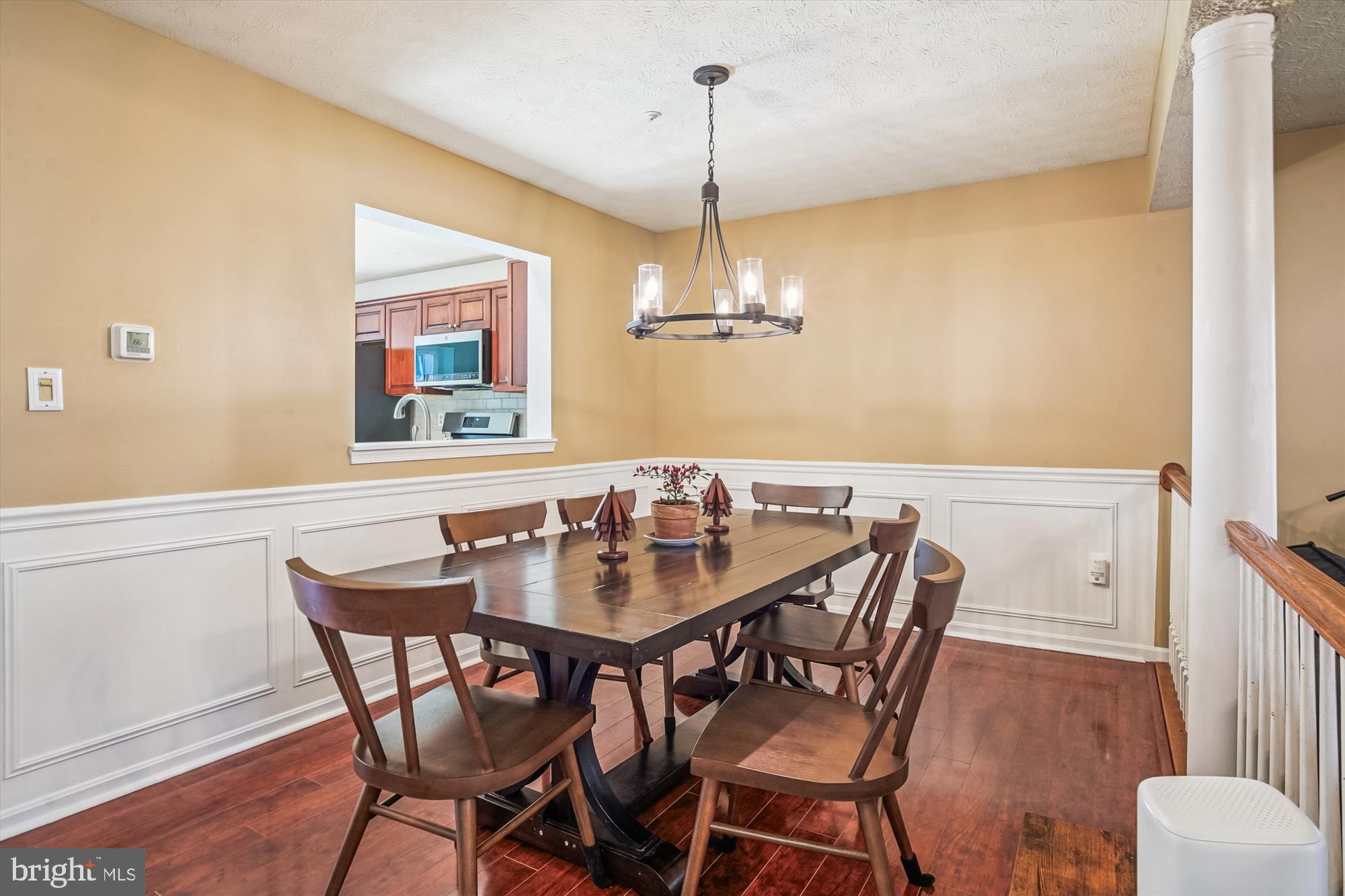 2542 Windy Oak Court Crofton, MD 21114 - Photo 10 of 37 a view of a dining room with furniture and wooden floor