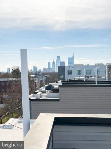 a view of a balcony with city