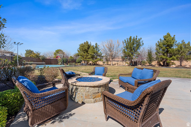 2917 Old Farm Road Washington, UT 84780 - Photo 83 of 105 View of patio featuring a fire pit