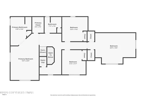 an aerial view of a house with garden space and street view