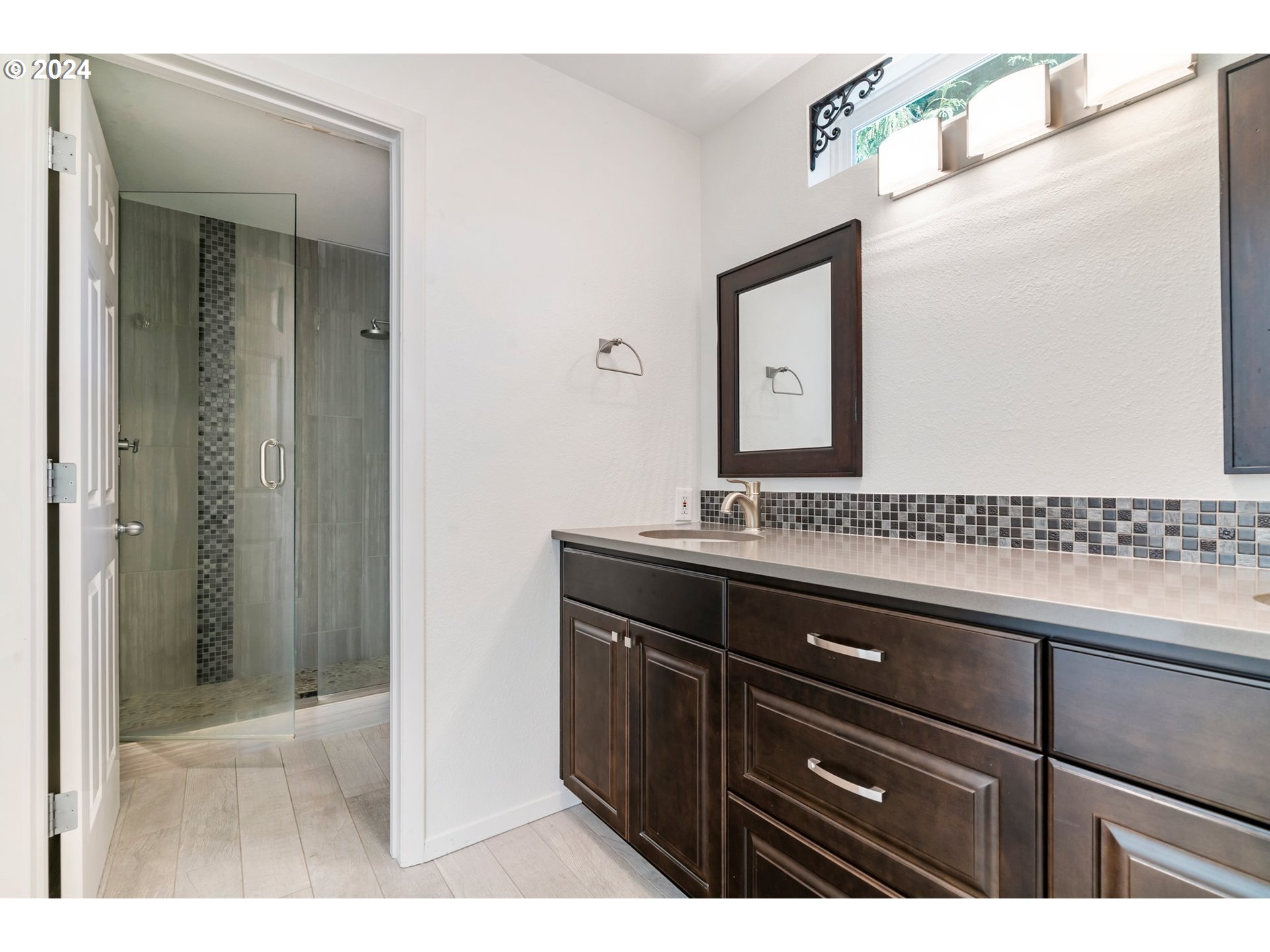 5225 Jean Road, Unit 501 Lake Oswego, OR 97035 - Photo 18 of 38 a bathroom with a sink and a mirror