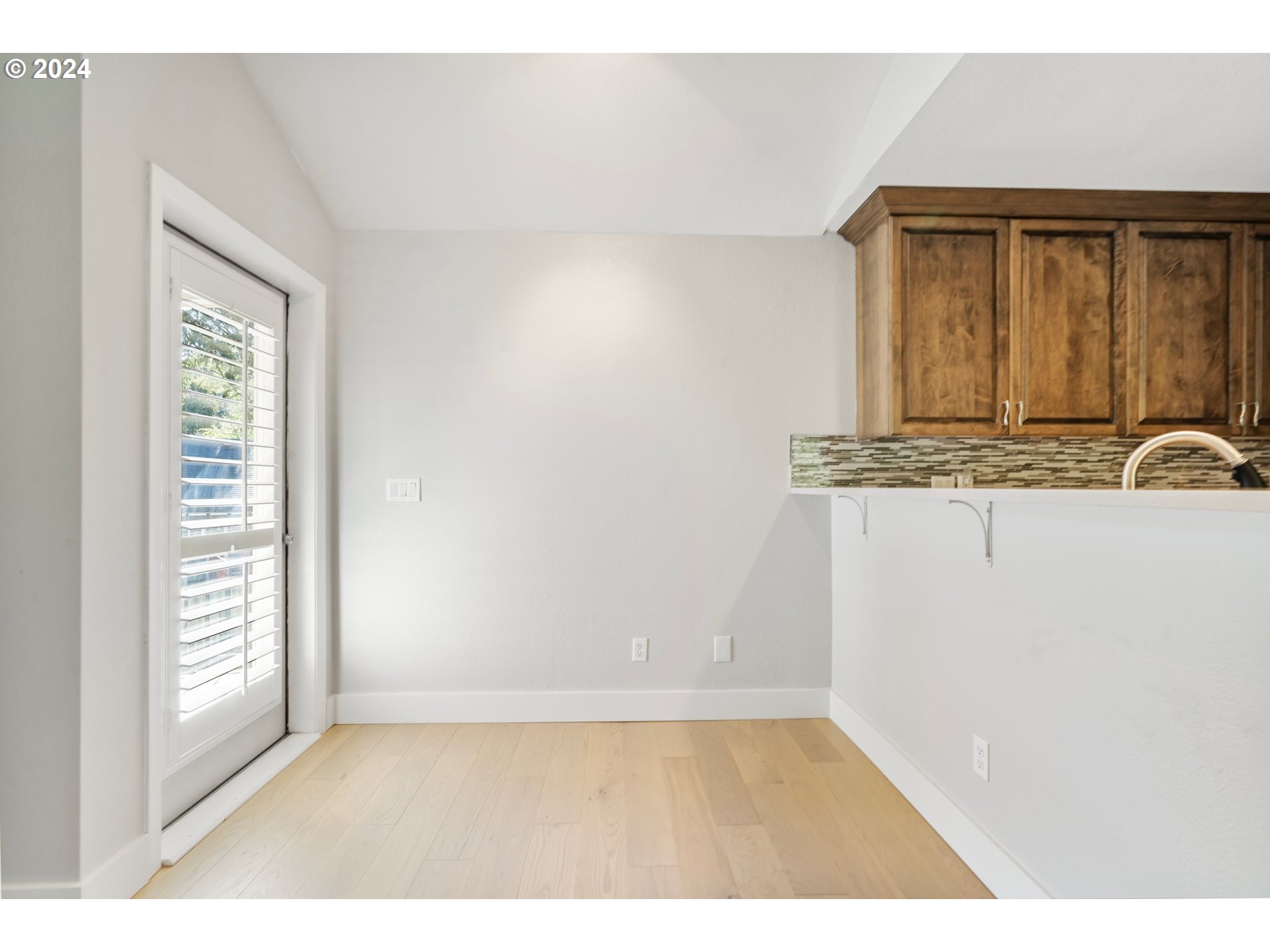5225 Jean Road, Unit 501 Lake Oswego, OR 97035 - Photo 9 of 38 view of wooden floor and windows in a room