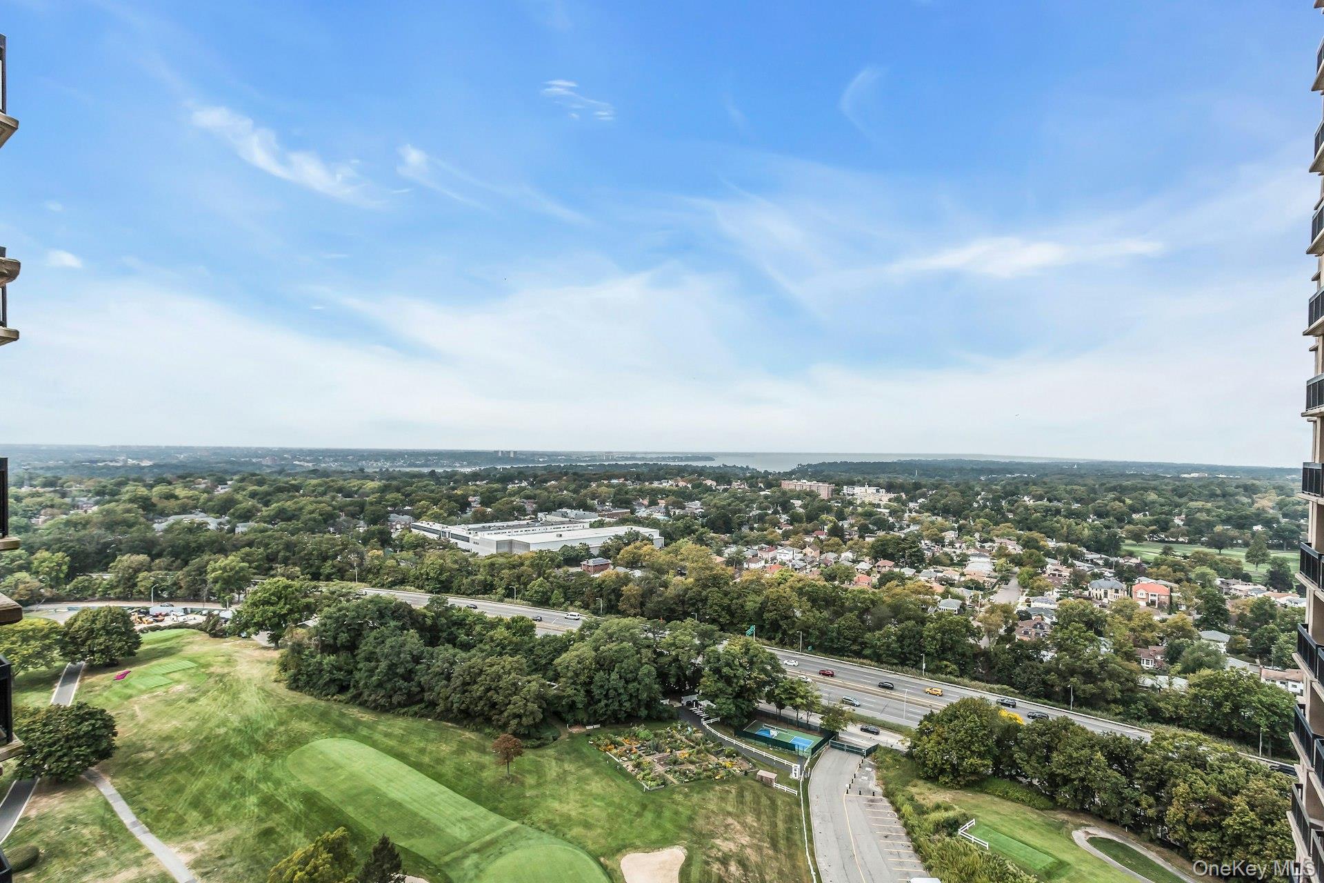 269 Grand Central Parkway, Unit 27T Queens, NY 11005 - Photo 15 of 43 an aerial view of residential houses with outdoor space