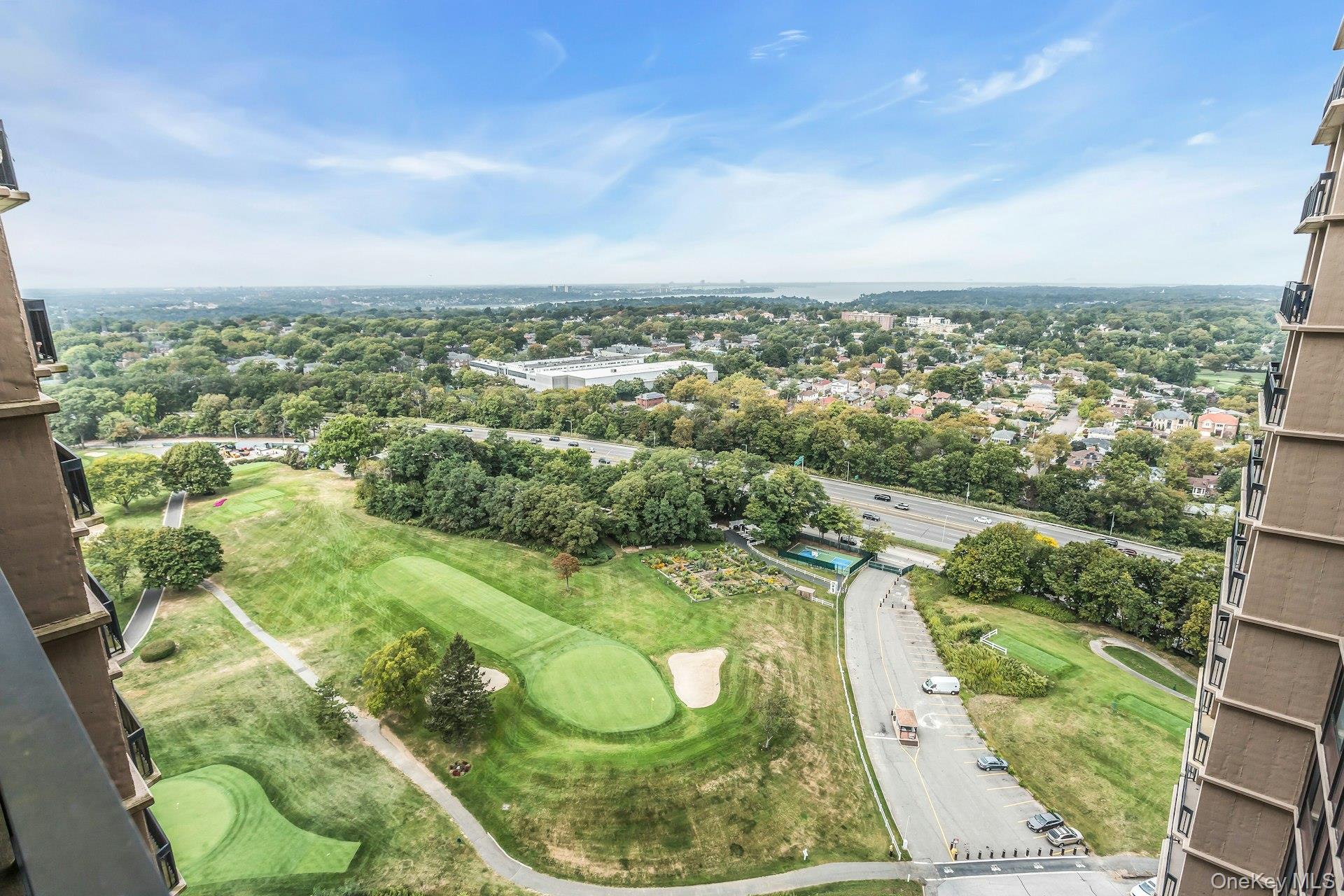 269 Grand Central Parkway, Unit 27T Queens, NY 11005 - Photo 16 of 43 an aerial view of residential houses with outdoor space