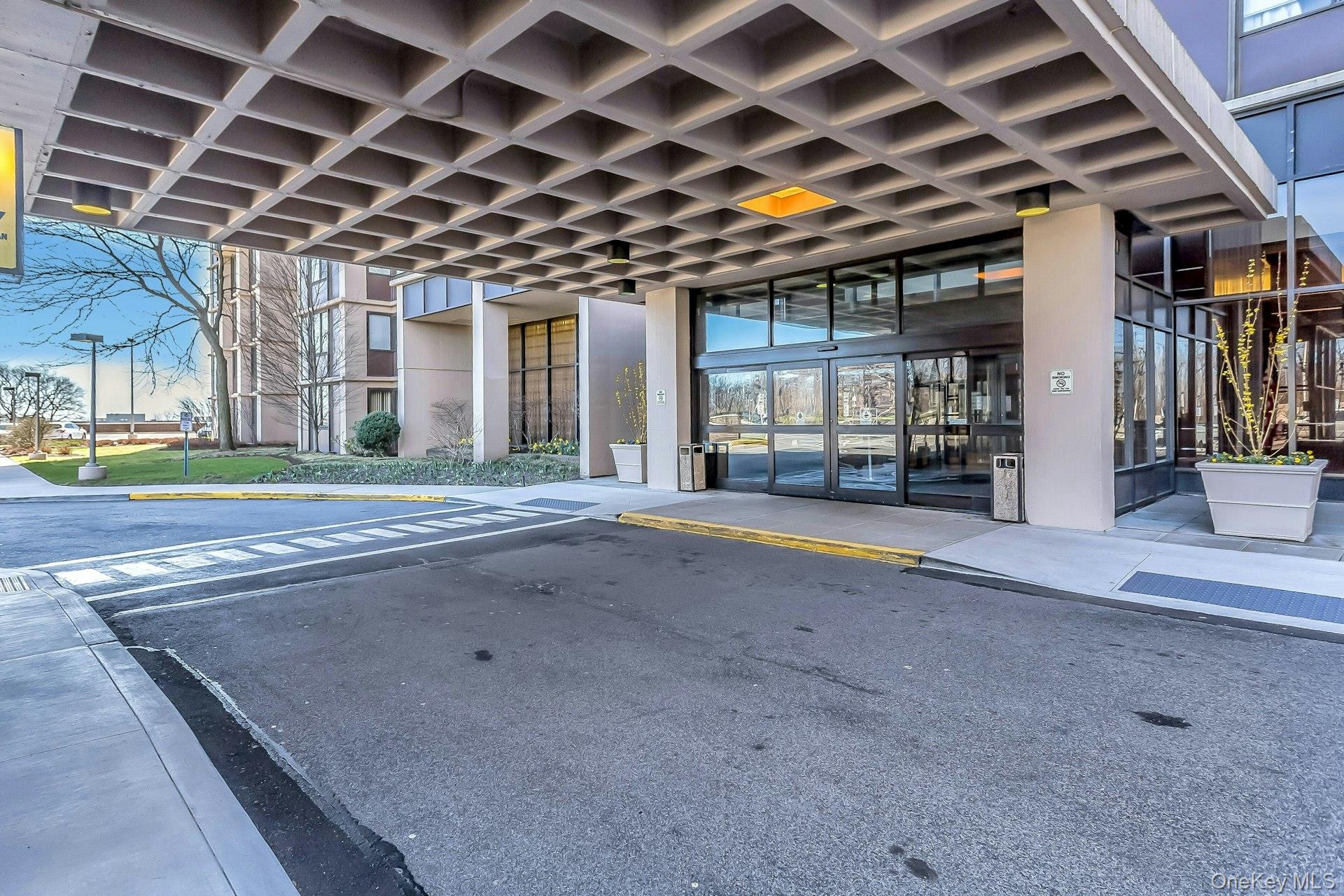 269 Grand Central Parkway, Unit 27T Queens, NY 11005 - Photo 25 of 43 a view of a room with wooden floor