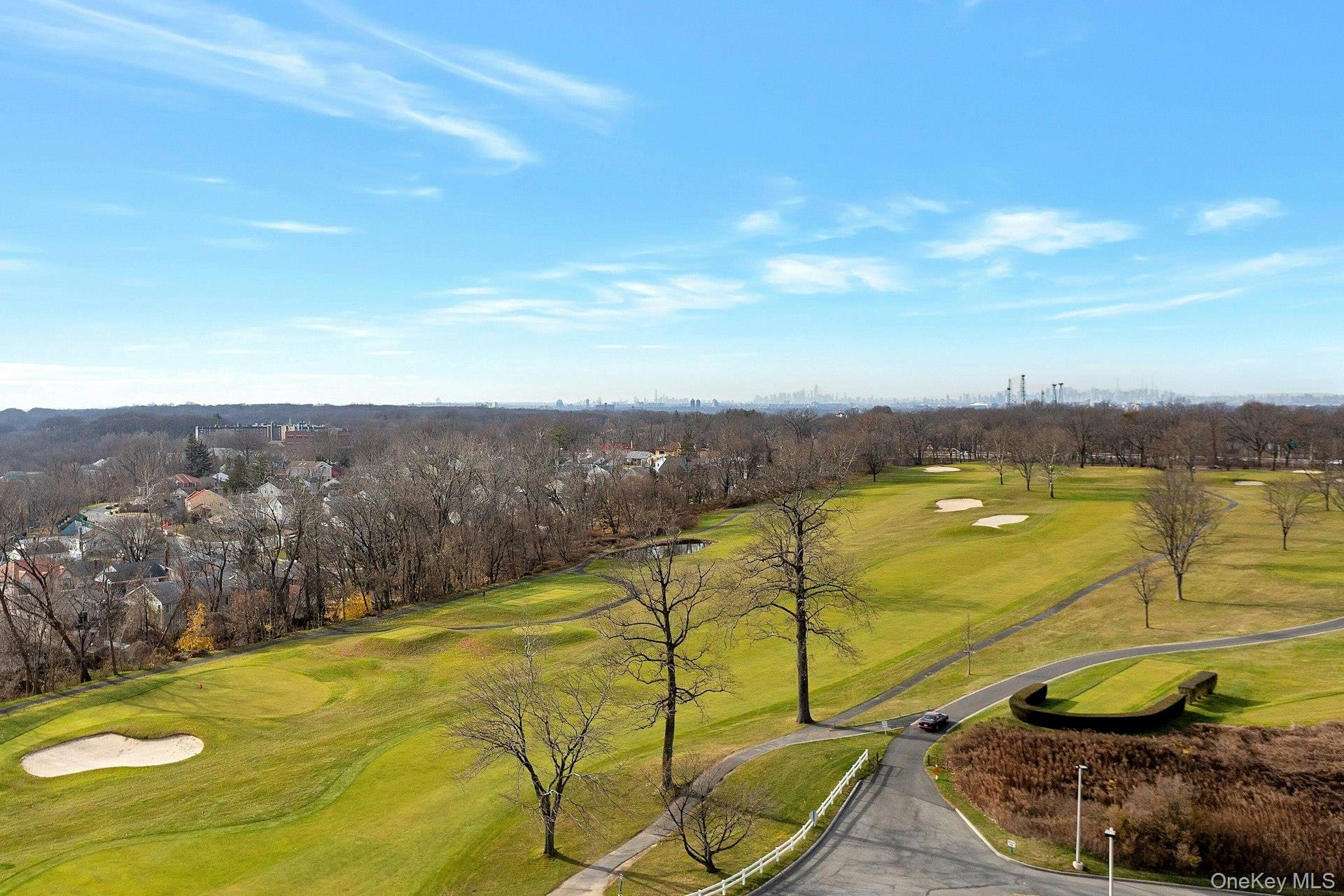 269 Grand Central Parkway, Unit 27T Queens, NY 11005 - Photo 30 of 43 a view of a swimming pool with a lounge chair