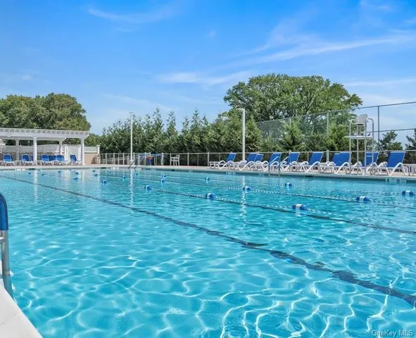 a view of outdoor space with deck and yard