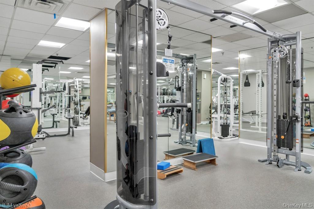 269 Grand Central Parkway, Unit 27T Queens, NY 11005 - Photo 37 of 43 a view of a room with gym equipment