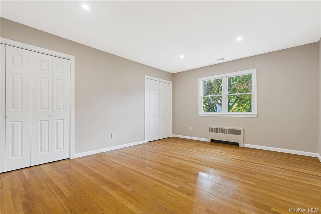 5 Paddock Road Rye Brook, NY 10573 - Photo 12 of 23 bedroom with two closets