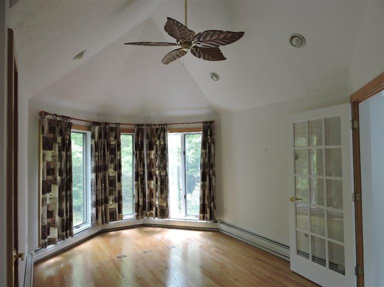 135 Pimlico Pond Road Mashpee, MA 02649 - Photo 23 of 35 a view of an empty room with a window