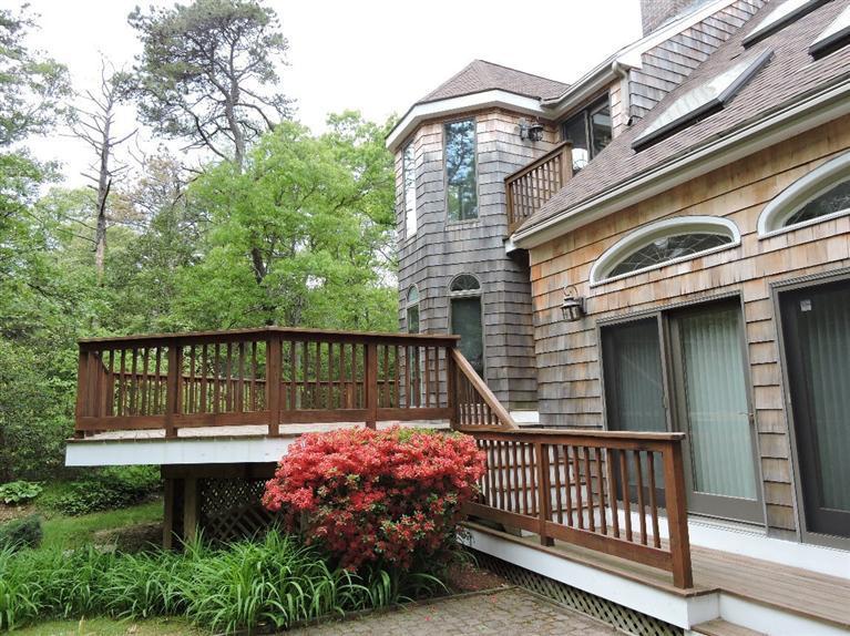 135 Pimlico Pond Road Mashpee, MA 02649 - Photo 6 of 35 a view of a roof deck with a bench