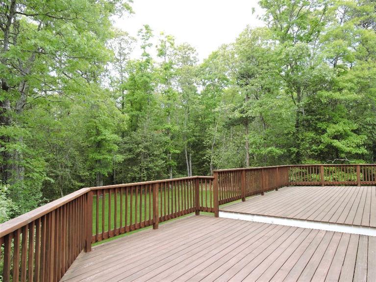 135 Pimlico Pond Road Mashpee, MA 02649 - Photo 8 of 35 a view of deck with wooden floor and fence