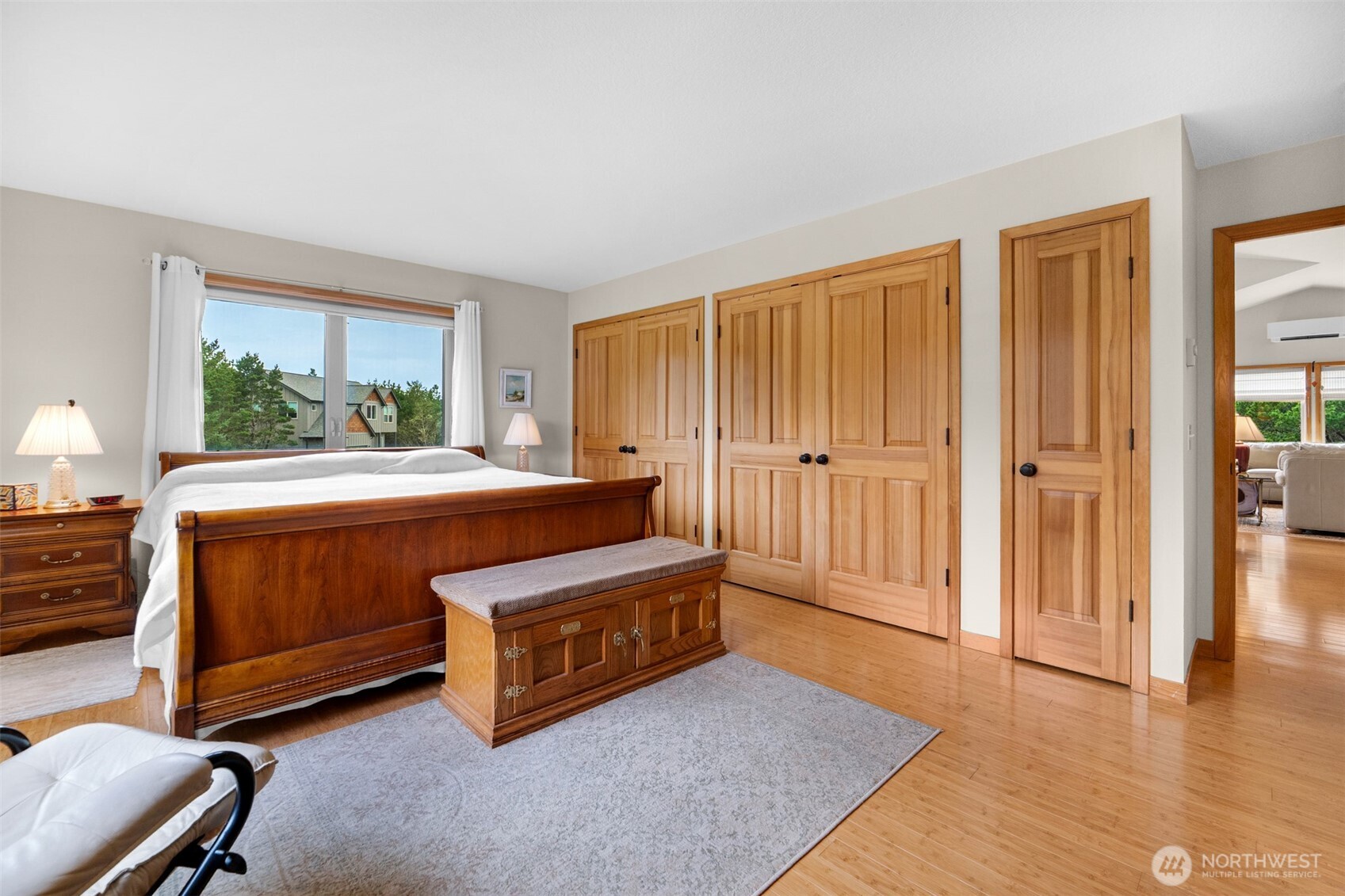 402 17th Street Southwest Long Beach, WA 98631 - Photo 13 of 32 a room with a bed and a window