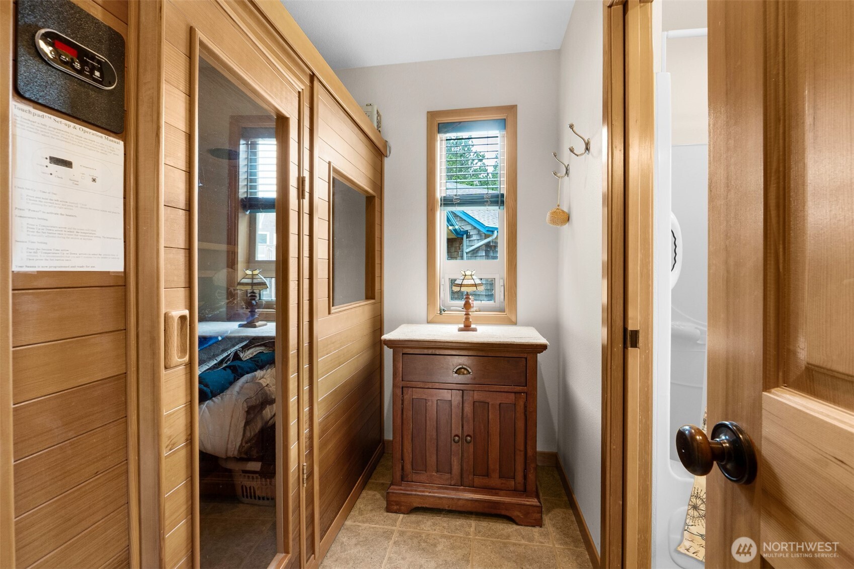 402 17th Street Southwest Long Beach, WA 98631 - Photo 16 of 32 a bathroom with a tub and shower view