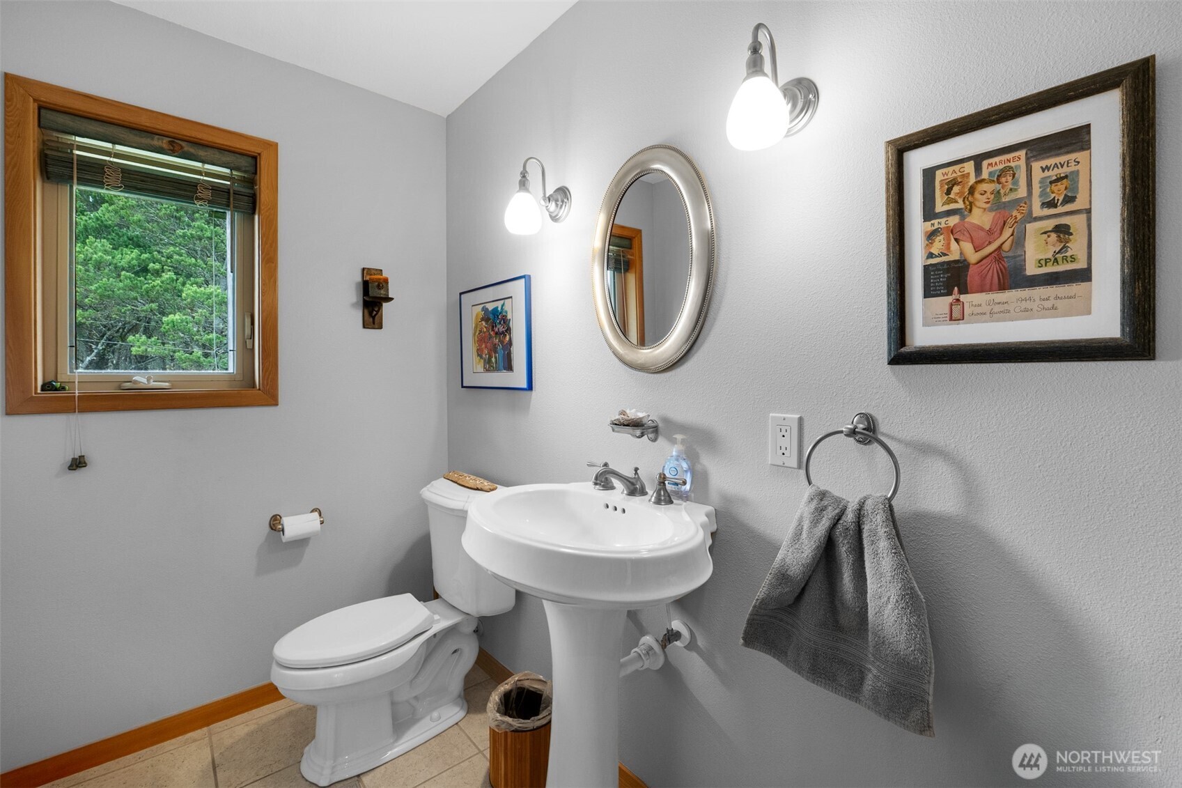 402 17th Street Southwest Long Beach, WA 98631 - Photo 18 of 32 a bathroom with a sink and a mirror