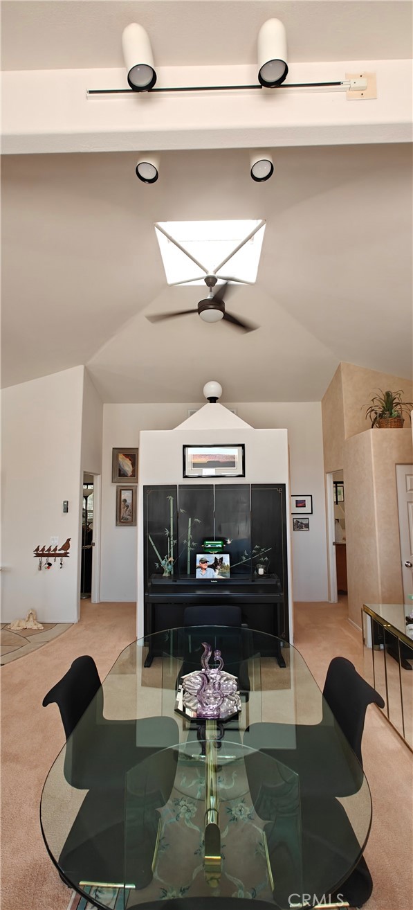6144 Carodean Road Twentynine Palms, CA 92277 - Photo 23 of 71 a living room with furniture and a chandelier